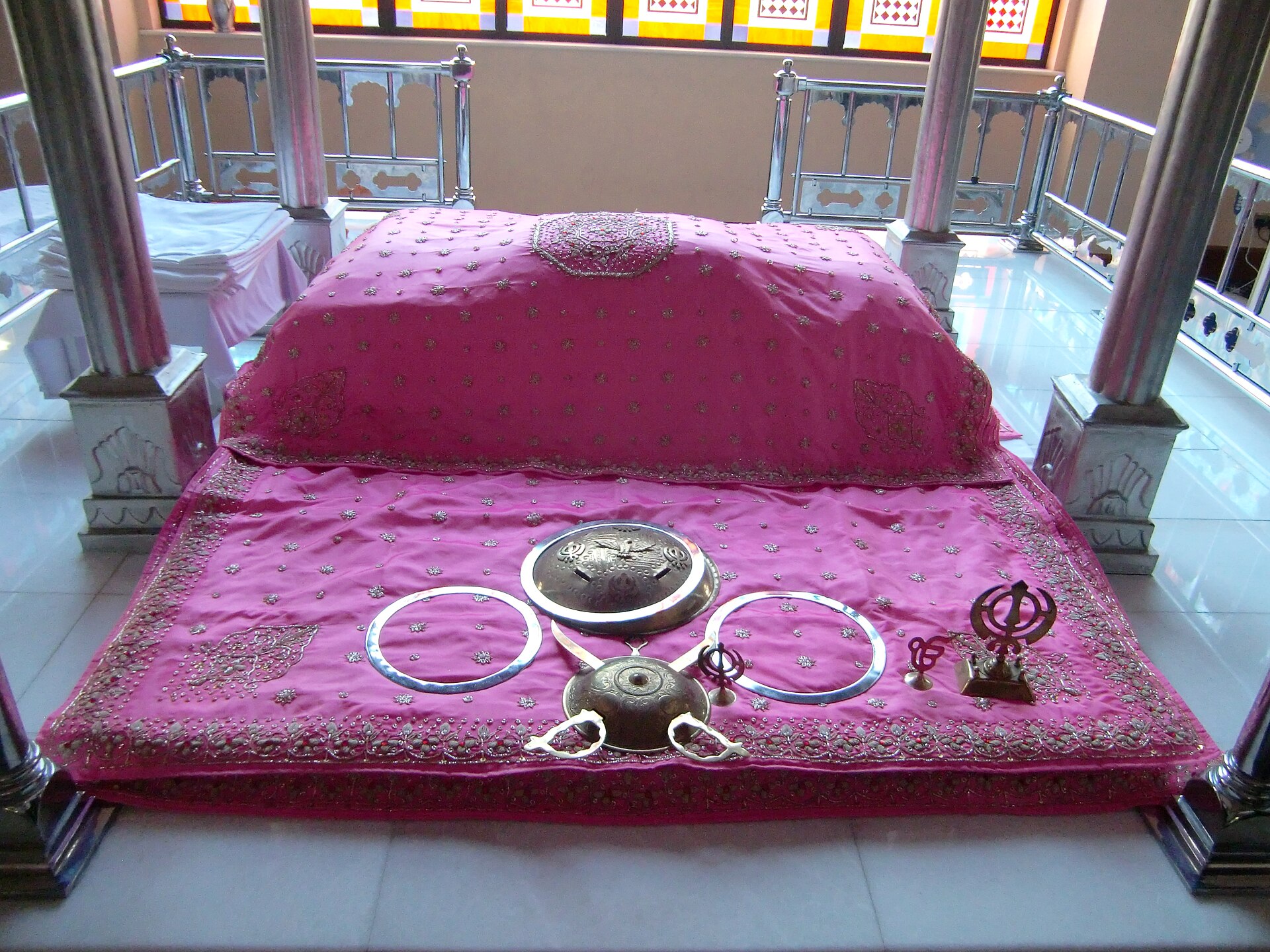 Sri Guru Granth Sahib Ji resting beneath a rumalla