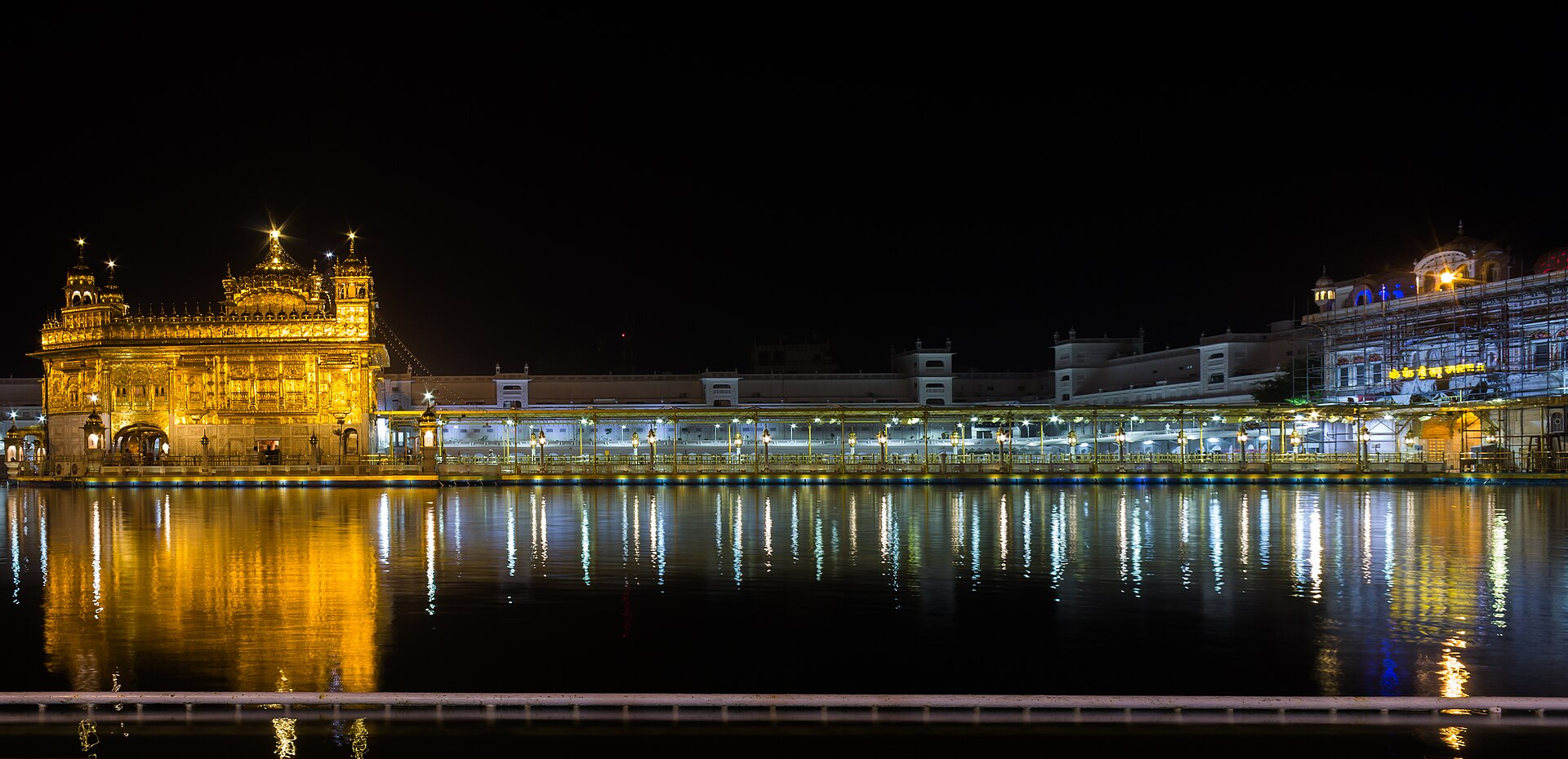 Sri Harmandir Sahib at night, reflected in the Amrit Sarovar